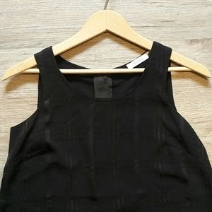Ricki's | Black sleeveless blouse